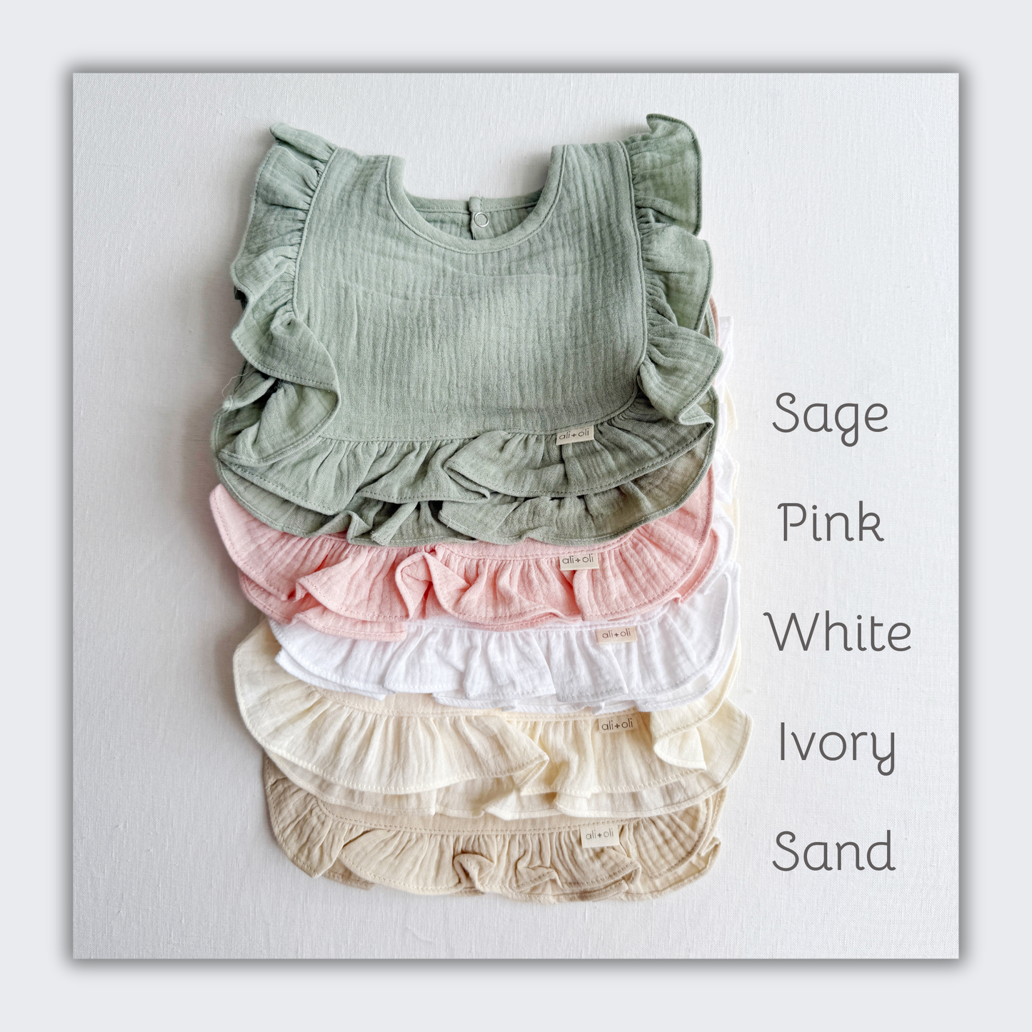 Muslin Cotton Ruffle Baby Bib (Sand) - 3 Feathers Design and Graphics & 3 Feathers Mercantile
